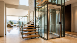 Glass residential elevator beside an open staircase in a bright modern home